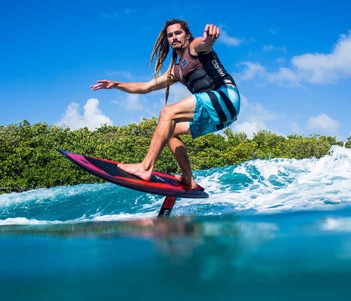 hydrofoil surfing behind boat