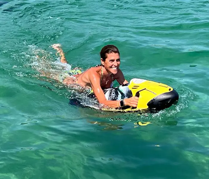Girl smiling when using a Seabob F5 customize color